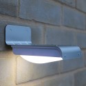 Lámpara LED solar al aire libre con sensor de movimiento y luz crepuscular