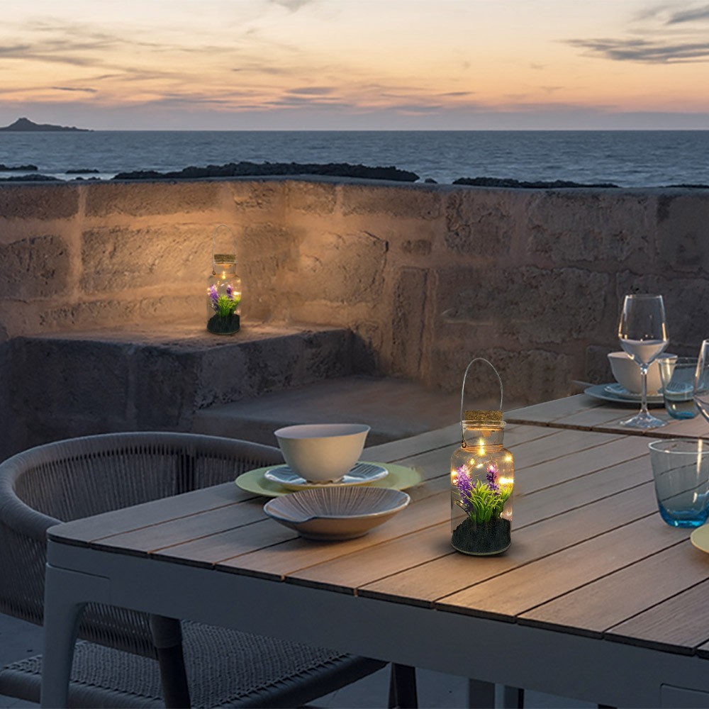 452415 Tarro de cristal con planta decorativa y...