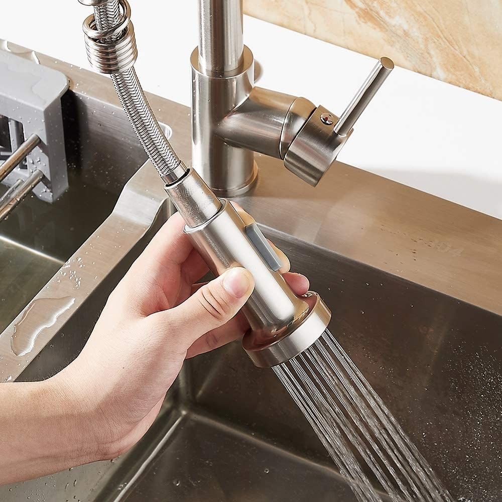 Grifo para fregadero extensible de muelle...