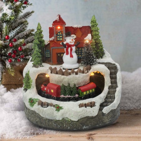 997068 Carrusel de paisajes navideños música, luces y movimiento con trenecito