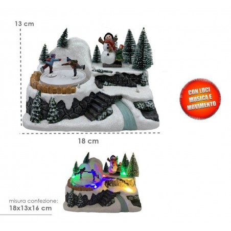 361004 Carrusel pueblo navideño con pista luces y movimiento musical 18x13x16cm