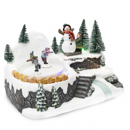 361004 Carrusel pueblo navideño con pista luces y movimiento musical 18x13x16cm